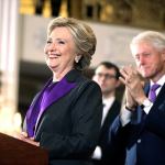 Former President Bill Clinton applauds as his wife speaks in New York on Wednesday, Nov. 9. (AP Photo/Andrew Harnik)