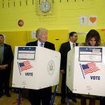 Republican presidential candidate Donald Trump looks at his wife Melania as they cast their votes at PS-59 on Tuesday, Nov. 8, in New York. (AP Photo/ Evan Vucci)