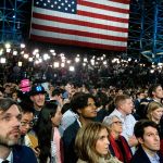 Supporters watch election results during Democratic presidential nominee Hillary Clinton&rsquo;s election night rally in the Jacob Javits Center glass enclosed lobby in New York on Tuesday, Nov. 8. (AP Photo/Frank Franklin II)