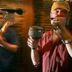 Harmonica play Jeff Nicely (right) and guitarist Roger Enders play blues late into the night at the Horseshoe Saloon on Hewitt Avenue in Everett in 2005. Nicely will host the Legends of the Blues IV in Arlington on Saturday. (Herald file photo)