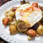 Roasted vegetable hash and eggs (Deb Lindsey for The Washington Post)
