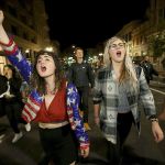 Madeline Lopes, left, and Cassidy Irwin, both of Oakland, march with other protesters in downtown Oakland, California, early Wednesday, Nov. 9. President-elect Donald Trump&rsquo;s victory set off multiple protests. (Jane Tyska/Bay Area News Group via AP)