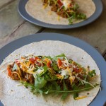 After making a batch recipe of taco meat and seasoning, Rose McAvoy seals up one of the three taco meals to go into a freezer for later use. (Andy Bronson / The Herald)