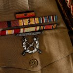 Paul Bartlett&rsquo;s uniform carries the Presidential Unit Citation for Iwo Jima with one star, and a battle star. (Dan Bates / The Herald)