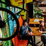 At Cafe Zippy in Everett on Tuesday morning, Colleen Scanlan (left) owner of the building that formerly housed Under the Red Umbrella, visits with Marilyn Rosenberg, who plans to move Cafe Zippy into Scanlan&rsquo;s building at 1502 Rucker Ave. by early January. (Dan Bates / The Herald)