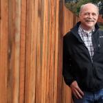 Larry Miller volunteered, recruited and fundraised to rebuild the fence at Cocoon House&rsquo;s north Arlington facility. A strong windstorm earlier this year damaged the fence. (Kevin Clark / The Herald)