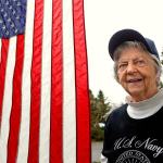 Ann Bjorneby still flies the U.S. flag in front of her home for her husband, Otto, who died of cancer in 1982. (Dan Bates / The Herald)