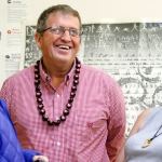 From left to right, Barbara Haldi, Larry Walker and Carey Walker share a laugh before the start of Larry Walker&rsquo;s retirement party at the Walt Price Student Fitness Center in Everett on Nov. 9. Larry Walker, athletic director and men&rsquo;s basketball coach at Everett Commuinty College, is retiring after 31 years. (Kevin Clark / The Herald)