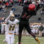 Archbishop Murphy&rsquo;s Anfernee Gurley makes a touchdown reception with Lynden&rsquo;s Conner Shine trailing during a 2A state semifinal game Saturday afternoon at Everett Memorial Stadium. The Wildcats won 52-14. (Kevin Clark / The Herald)