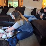 Brayden Varnes gets his diaper changed by his mom, Jessiana King, with Jacob Varnes at her home in Granite Falls. (Kevin Clark / The Herald)