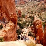 Portions of the trail at Devil&rsquo;s Garden require scrambling along large sandstone boulders with drop-offs on both sides. (Jon Bauer/The Herald)