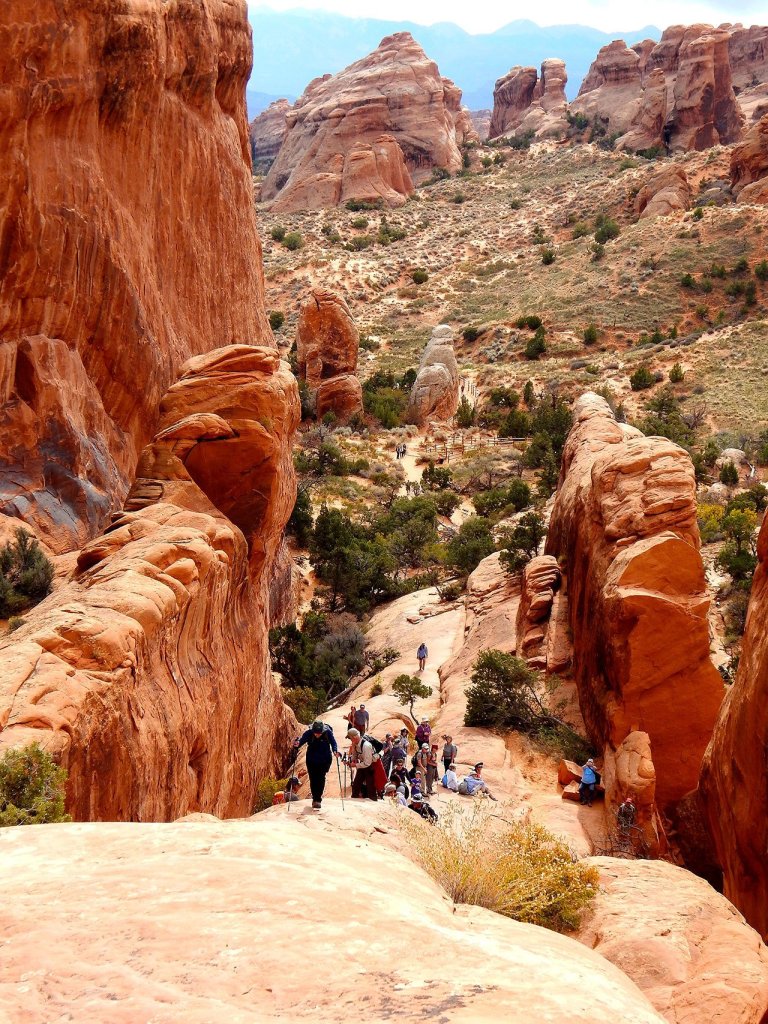 Portions of the trail at Devil&rsquo;s Garden require scrambling along large sandstone boulders with drop-offs on both sides. (Jon Bauer/The Herald)