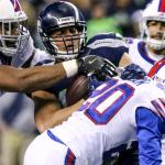 Seahawks tight end Jimmy Graham is tackled by Bills linebacker Lerentee McCray (left) and safety Corey Graham after a reception Monday night at Century Link Field in Seattle on November 7, 2016. The Seahawks won 31-25. (Kevin Clark / The Herald)