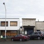 The buildings have been abandoned since the county took hold of the block with plans, since canceled, to build a new courthouse. (Ian Terry / The Herald)