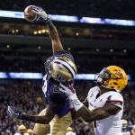 Washington defensive back Kevin King intercepts a pass in the end zone intended for Arizona State&rsquo;s N&rsquo;Keal Harry Saturday at Husky Stadium in Seattle. (Kevin Clark / The Herald)