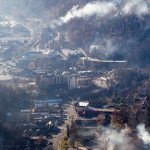 Burned structures are seen from aboard a National Guard helicopter near Gatlinburg, Tennessee, on Tuesday, Nov. 29. (AP Photo/Erik Schelzig)