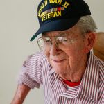 Raymond Lund, 95, is a World War II veteran who served in Europe, including the beach landing at Normandy. (Dan Bates / The Herald)