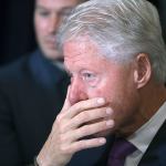 Former President Bill Clinton listens as his wife delivers her concession speech in New York on Wednesday, Nov. 9. (AP Photo/Andrew Harnik)