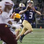 Washington quarterback Jake Browning attempts a pitch into the end zone against Arizona State on Saturday at Husky Stadium in Seattle. (Kevin Clark / The Herald)