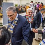 Governor Jay Inslee (left) and Republican candidate for governor Bill Bryant chat with the organizers of the Asian Pacific American Community Summit at the Tacoma Dome Exhibition Hall on Sept. 15. The two candidates had just come off the stage where they answered quesitons in a forum which included translation for speakers of 27 different languages. (Peter Haley / The Tacoma News Tribune)