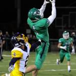 Woodinville&rsquo;s Peyton Chester intercepts a pass intended Mariner&rsquo;s Anthony Allen, left, to end the first half during a 4A state playoff game at Pop Keeney Stadium in Bothell on November 11, 2016. (Kevin Clark / The Herald)