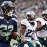 Seahawks running back C.J. Prosise races for the endzone with Eagles safety Rodney McLeod (23) and Eagles defensive lineman Fletcher Cox (91) giving chase Sunday afternoon at Century Link Field in Seattle on November 20, 2016. (Kevin Clark / The Herald)