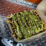 Carne Asada &ldquo;Nacho Fries&rdquo; from Vet Chef were on of many offerings from three local food trucks in downtown Everett on Friday. (Ian Terry / The Herald)