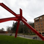 Mark di Suvero&rsquo;s &ldquo;For Handel&rdquo; sculpture towers above pedestrians on the Western Washington University campus on Friday, Nov. 11. A walk through campus gives visitors a chance to see a variety of sculptures from both local and internationally renowned artists. (Ian Terry / The Herald)