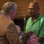 Ian Terry / The Herald John Lovick (right) is congratulated by a supporter during a democrat viewing party at Nile Shriners in Mountlake Terrace on Tuesday, Nov. 8. Photo taken on 11082016                                State Rep. John Lovick (right) is congratulated by a supporter during a Democratic party at Nile Shriners in Mountlake Terrace on Tuesday. Lovick was leading in his 44th District race with Republican Janice Huxford. (Ian Terry / The Herald)