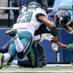 Seahawks wide receiver Tyler Lockett reaches for the goal line and tackled out of bounds by Eagles safety Rodney McLeod Sunday afternoon at CenturyLink Field in Seattle on November 20, 2016. (Kevin Clark / The Herald)