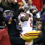 Southern California defensive back Adoree&rsquo; Jackson intercepts a pass intended for Washington wide receiver Aaron Fuller Saturday night at Husky Stadium in Seattle on November 12, 2016. (Kevin Clark / The Herald)