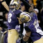 Washington wide receiver Dante Pettis (left) and Washington tight end Darrell Daniels celebrate Pettis&rsquo; touchdown against Arizona State on Saturday at Husky Stadium in Seattle. (Kevin Clark / The Herald)