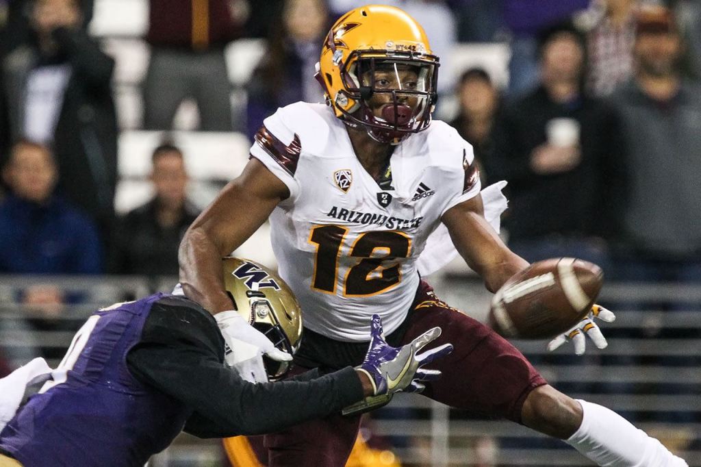 Arizona State&rsquo;s Tim White attempts a catch with Washington defensive back Brandon Beaver defending Saturday at Husky Stadium in Seattle. (Kevin Clark / The Herald)