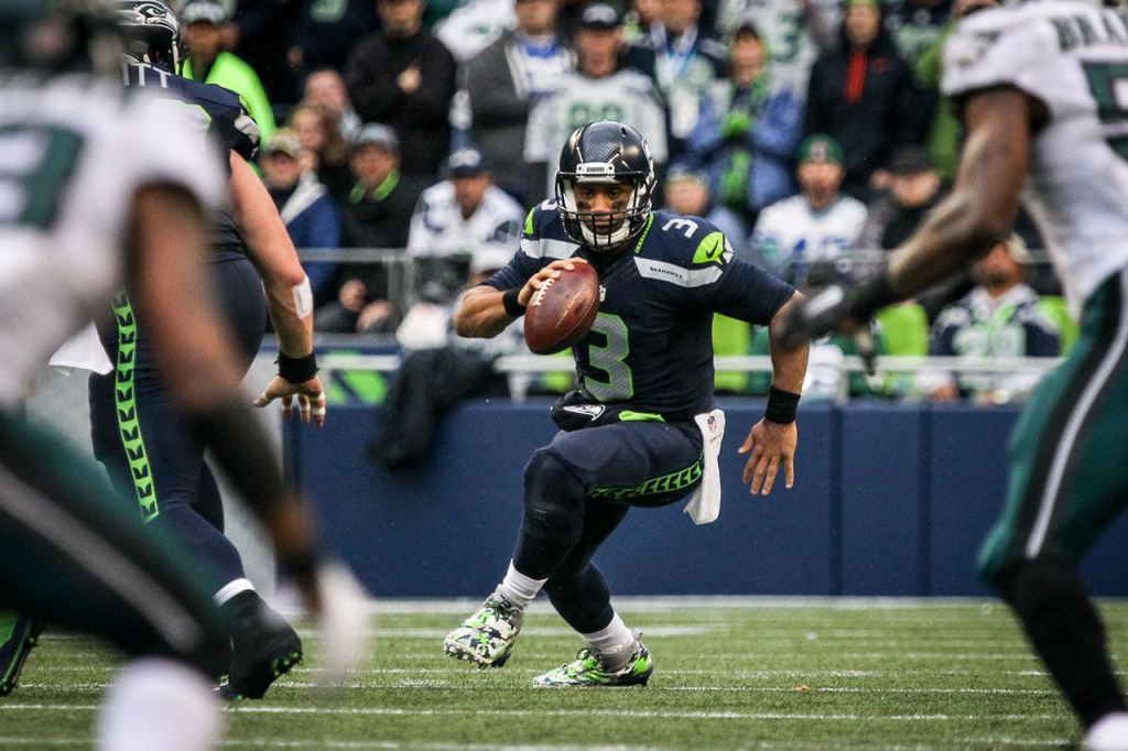 Seahawks quarterback Russell Wilson scrambles against the Philadelphia Eagles Sunday afternoon at CenturyLink Field in Seattle on November 20, 2016. Seahawks won 26-15. (Kevin Clark / The Herald)
