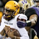 Arizona State&rsquo;s Manny Wilkins is sacked by Washington linebacker DJ Beavers Saturday at Husky Stadium in Seattle. (Kevin Clark / The Herald)