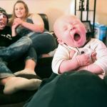 Jessica Warren holds her grandson, Brayden Varnes, while parents Jacob Varnes and Jessiana King look on at Warren&rsquo;s home in Granite Falls. (Kevin Clark / The Herald)