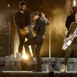 Charles Sykes / Invision                                Tim McGraw (center) Brian Kelley (left) and Tyler Hubbard (right) of Florida Georgia Line perform at the 50th annual CMA Awards at the Bridgestone Arena on Nov. 2 in Nashville, Tennessee. The hot country act will perform tonight at the Tacoma Dome.