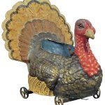 No, the large turkey was not made as a Thanksgiving decoration. It is an antique part for a game of skittles that sold at auction for more than $2,000. But it would look great on the holiday dinner table. (Cowles Syndicate Inc.)