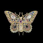Butterflies bring change and transformation, according to past traditions. Or they may represent a free spirit. The beauty of this butterfly pin made of precious jewels and gold brought an auction bid of $5,000. It was made in Russia a hundred years ago. (Cowles Syndicate Inc.)