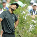Tiger Woods stretches before teeing off on the first hole during Thursday&rsquo;s opening round of the Hero World Challenge on in Nassau, Bahamas. (AP Photo/Lynne Sladky)