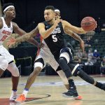 Gonzaga guard Nigel Williams-Goss (5) is fouled by Florida guard Kasey Hill while driving to the basket in front of center John Egbunu (15) during a game Nov. 25 in Lake Buena Vista, Fla. (AP Photo/Phelan M. Ebenhack)