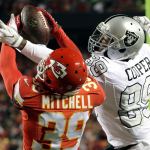 Chiefs defensive back Keith McGill II (39) nearly intercepts a pass intended for Raiders wide receiver Amari Cooper (89) during the first half of a game Thursday in Kansas City, Mo. (AP Photo/Charlie Riedel)