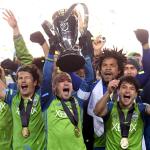 Members of the Seattle Sounders celebrate after winning the MLS Cup final over Toronto FC on Saturday in Toronto. (Frank Gunn / The Canadian Press via AP)