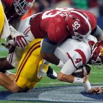USC quarterback Max Browne (4) is sacked by Alabama defensive lineman Jonathan Allen during a game Sept. 3 in Arlington, Texas. (AP Photo/Tony Gutierrez)