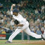 Seattle&rsquo;s Arquimedes Caminero throws against Detroit on Aug. 8 in Seattle. Sources say Caminero is close to signing with the Yomiuri Giants of Japan&rsquo;s Central League. (AP Photo/Elaine Thompson)