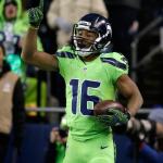 Seahawks wide receiver Tyler Lockett celebrates after making a catch for a touchdown in the second half of Thursday&rsquo;s game. (AP Photo/Elaine Thompson)