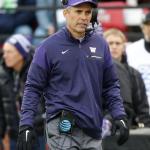 Washington head coach Chris Petersen stands on the sidelined during the Apple Cup against Washington State on Nov. 25 in Pullman. The Huskies beat the Cougars 45-17. (AP Photo/Ted S. Warren)