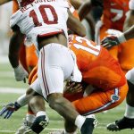 Alabama linebacker Reuben Foster (10), shown here tackling Florida&rsquo;s Austin Appleby (12) during the SEC championship game on Dec. 3, said he took an official visit to UW before committing to the Crimson Tide. Foster will battle the Huskies in the Peach Bowl on Saturday .(AP Photo/John Bazemore)
