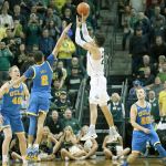 Oregon&rsquo;s Dillon Brooks (center right) rises up for what would prove to be the game-winning basket as UCLA&rsquo;s Thomas Welsh (left), Lonzo Ball and Bryce Alford (right) defend on Wednesday as the No. 21 Ducks upset the No. 2 Bruins on Wednesday in Eugene, Ore. (AP Photo/Chris Pietsch)