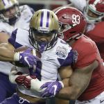 Alabama defensive lineman Jonathan Allen (93) tackles Washington running back Myles Gaskin (9) during the first half of the Peach Bowl on Saturday in Atlanta. (AP Photo/David Goldman)